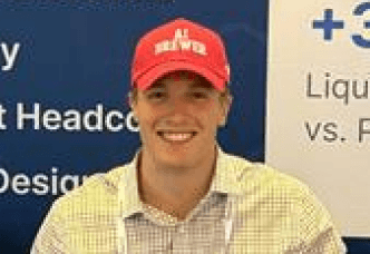 guy with ai brewer cap